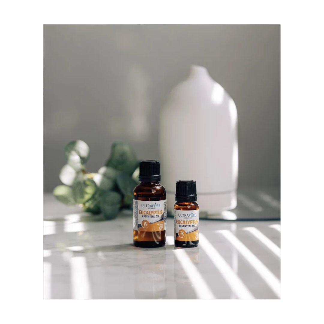 Ultrapure Eucalyptus Essential Oil 25ml container on a marble countertop 