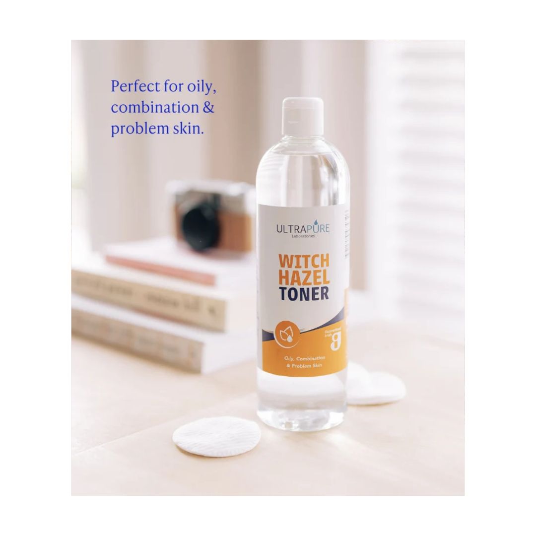 Ultrapure Witch Hazel Toner 125ml on a kitchen counter with a cotton pad next to it