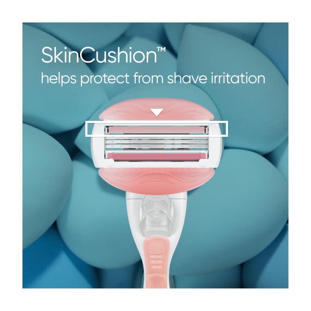 Gillette Venus ComfortGlide Spa Breeze Razor on a blue background with the caption 'SkinCushion'
