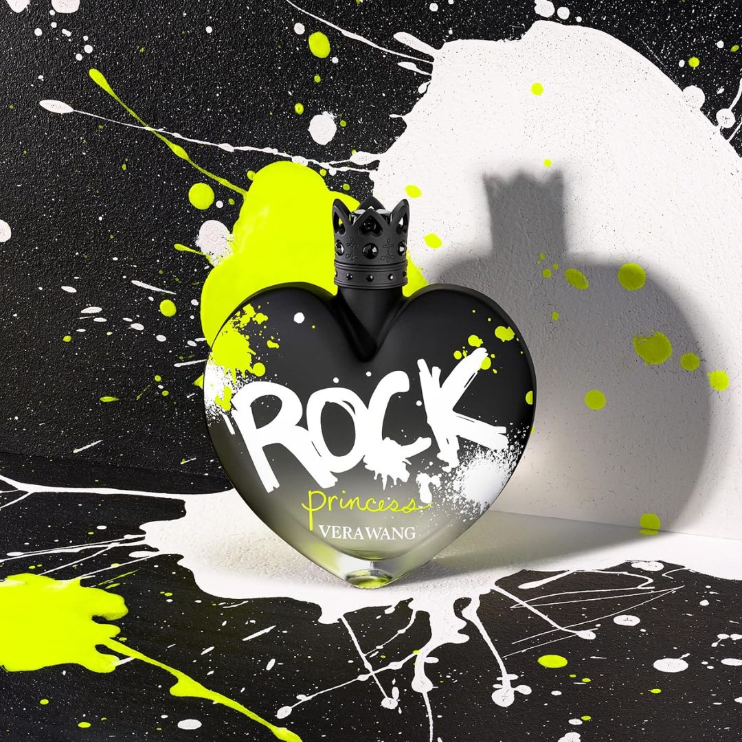 Vera Wang Rock Princess Eau de Toilette 100ml on a paint splattered black background