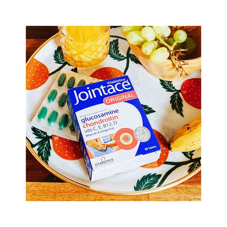 Vitabiotics Jointace Original 30 Tablets packaging in a fruit bowl setting