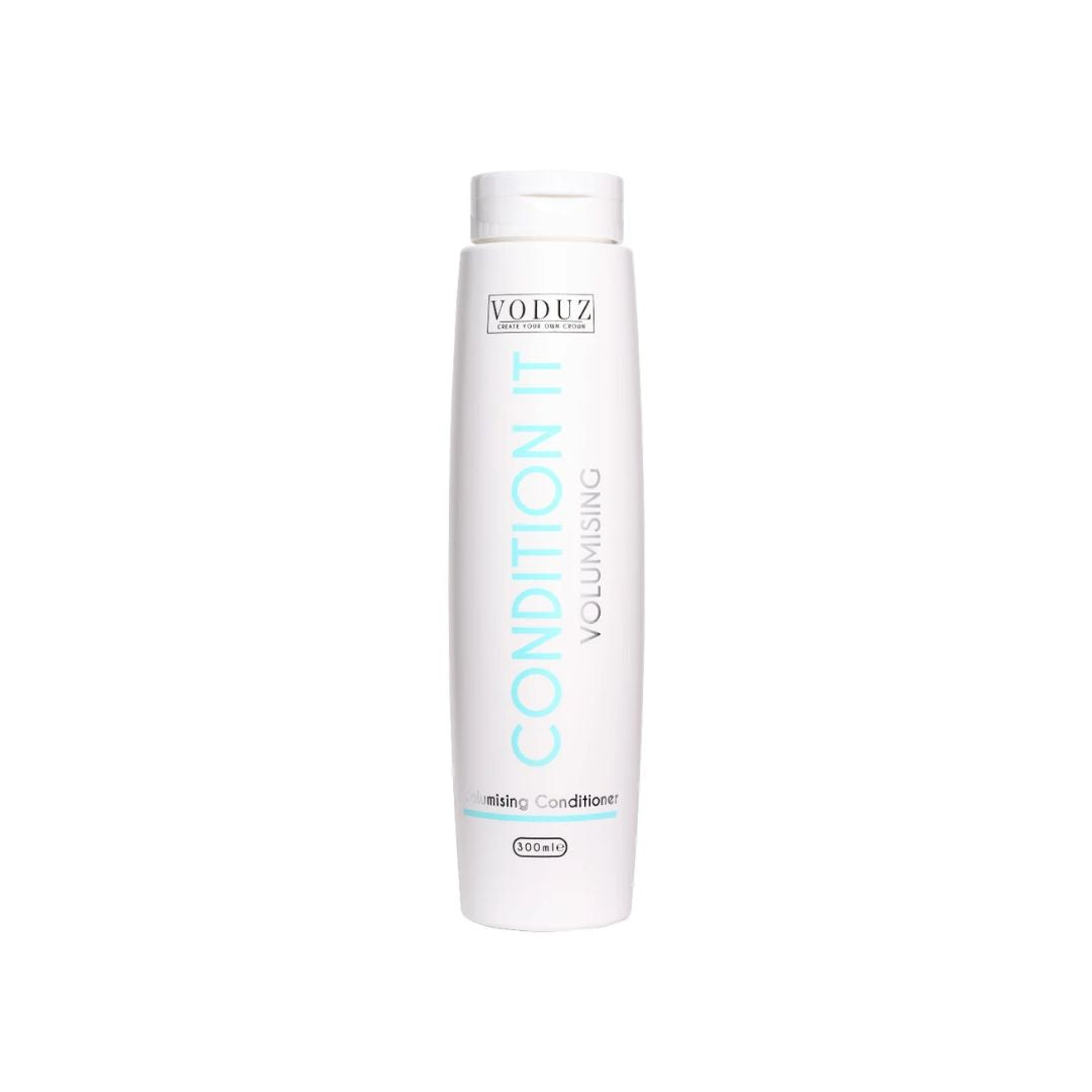 A white bottle of VODUZ Condition It Volumising Mising Conditioner on a solid white background.