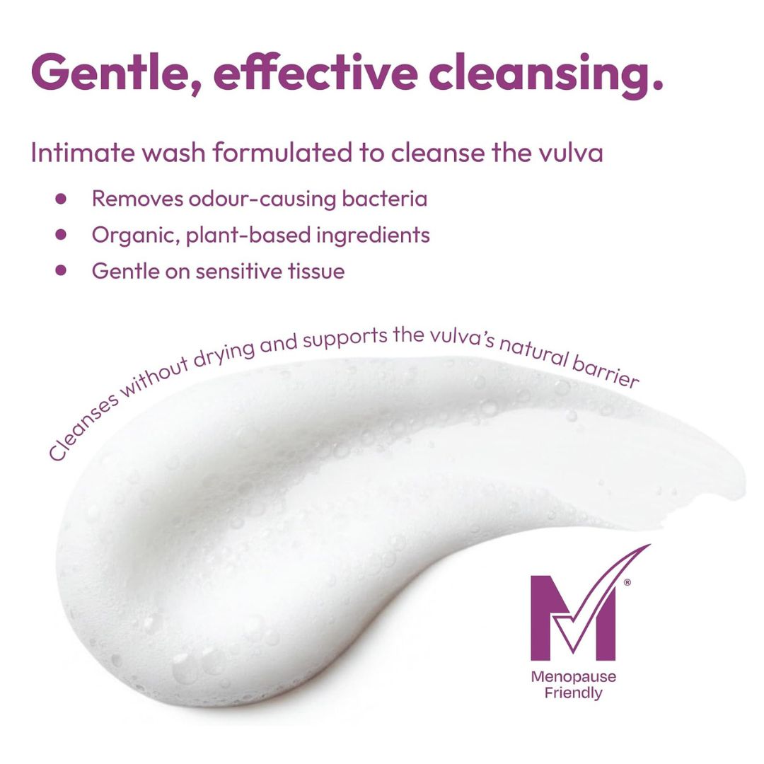Promotional graphic for an intimate cleansing wash, showing a white creamy product smear on a white background with purple text describing benefits and a purple Menopause Friendly logo.