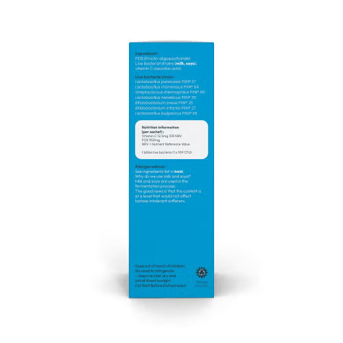 The back of a tall blue rectangular product box with white text and a white nutrition panel, photographed on a plain white background.
