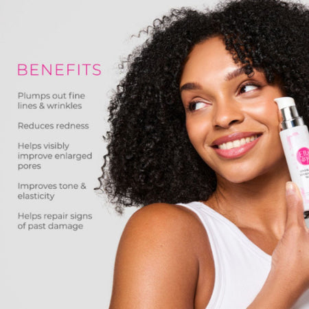 Woman holding a skincare product with benefits listed on a light gray background