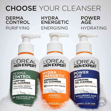 Three L'Oréal Men Expert cleansers shown on a light gray background with text labels above each bottle: Derma Control Purifying, Hydra Energetic Energising, and Power Age Hydrating.