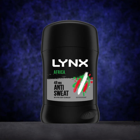 A black Lynx Africa anti-sweat deodorant stick centered on a dark textured blue background, with the Lynx logo and product label clearly visible.