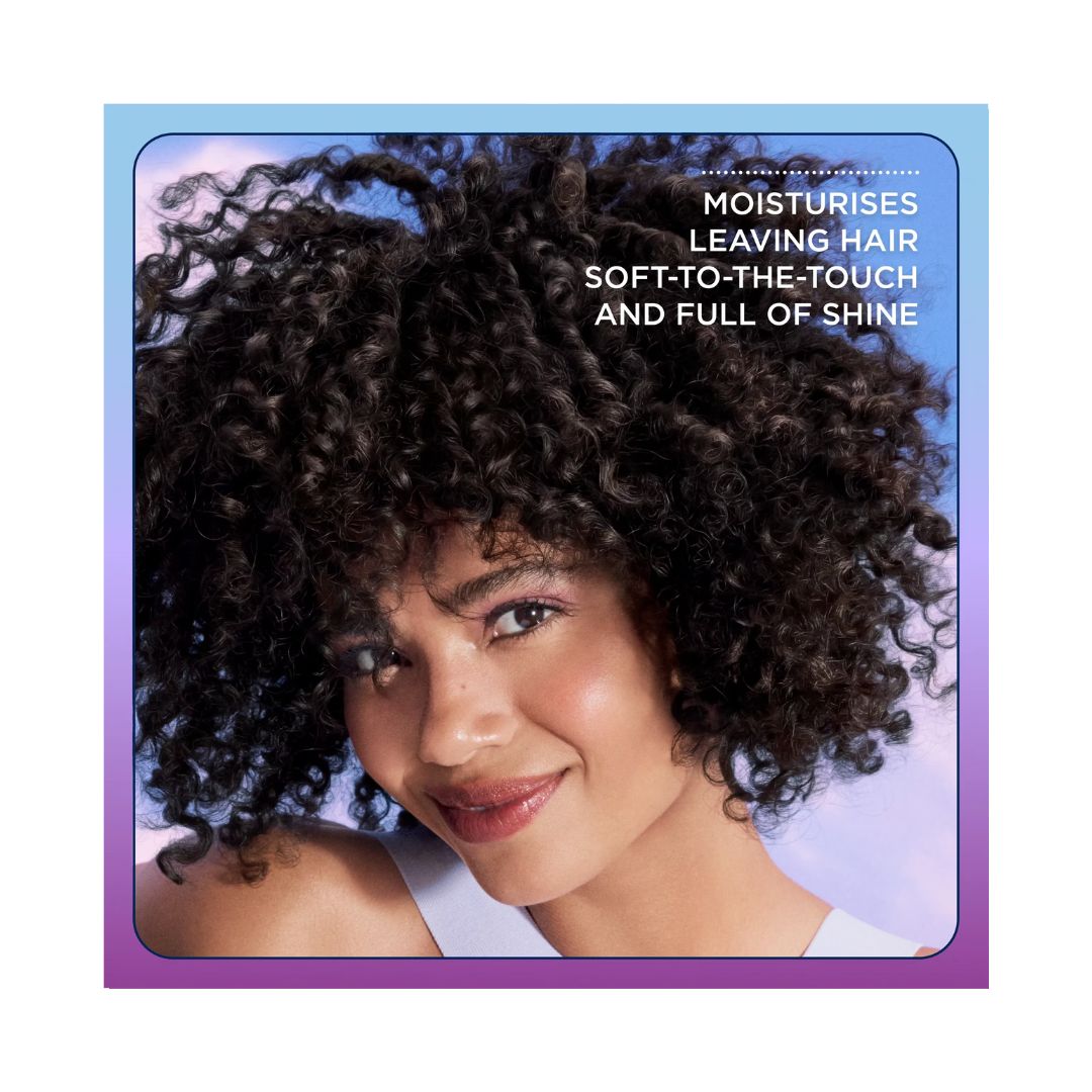 Clairol Nice'n Easy Tone + Gloss 200/83 woman with curly black hair on a blue background with product effects listed in top right corner