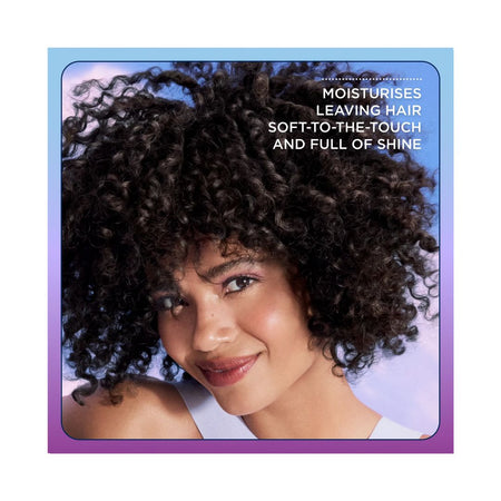 Clairol Nice'n Easy Tone + Gloss 200/83 woman with curly black hair on a blue background with product effects listed in top right corner