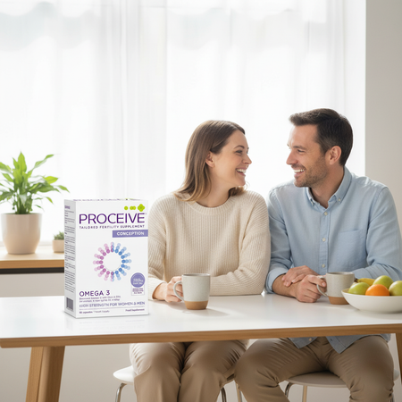 Couple sitting at a table with a Proceive supplement box in front of them.